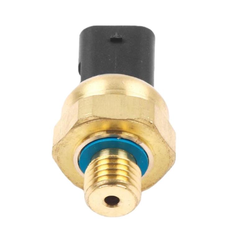 Oil pressure sensor with blue sealing ring and brass base with black top connector.