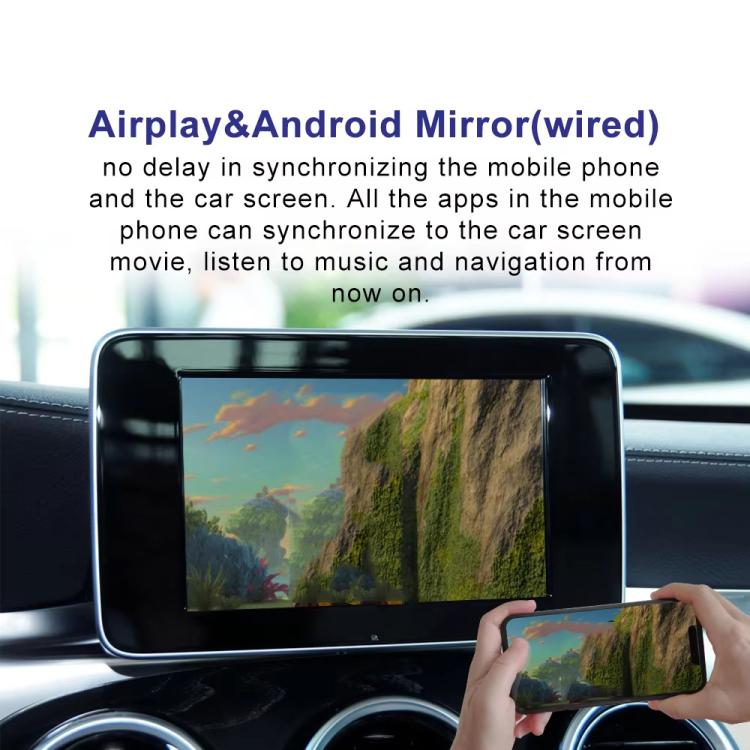 Car infotainment screen showing mirrored content while a smartphone is held nearby