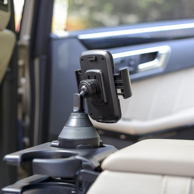 Universal car cup holder phone mount installed on console, holding phone vertically