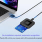 Black card reader connected to a laptop USB port with blue bank card
