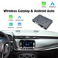 Wireless CarPlay/Android Auto decoder module connected to car dashboard touchscreen display.