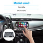 Wireless CarPlay decoder module installed in car, with vehicle touchscreen and hand control.