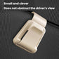 Beige car sunglasses clip ticket and card holder clipped onto textured surface.