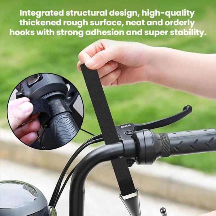 Motorcycle front metal hook with strap being attached near the handlebar