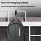 Metal hanging hook with strap for suspending a backpack from the prongs