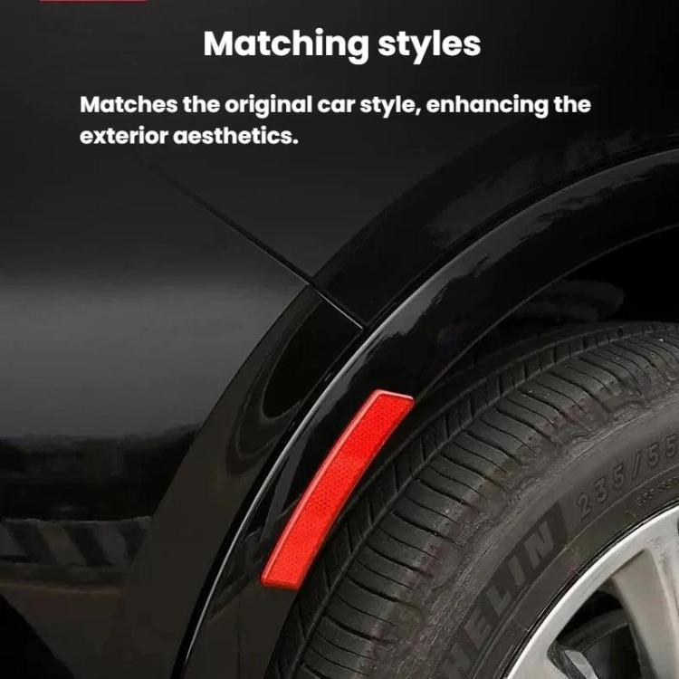 Red reflective side fender marker decal strip near the tire