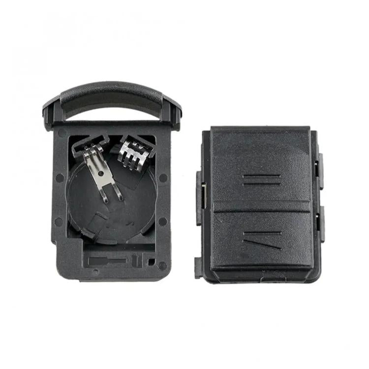 Replacement key fob shell with battery holder, open interior with metal contacts, dark gray