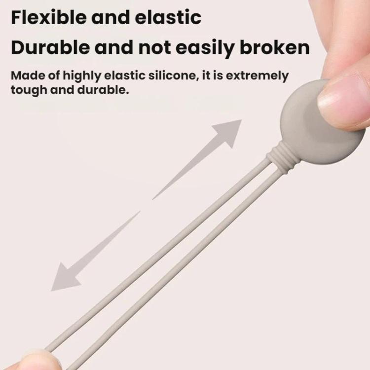 Gray elastic silicone cable organizer tie stretching along a cord