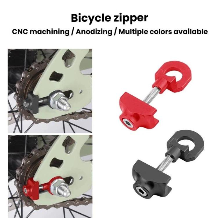 Bicycle chain breaker tool in red and black, with threaded adjustment screw