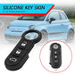 Black key fob button shell with lock, unlock, and trunk-style icon
