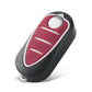 Black folding key shell with red button face and visible key ring stem