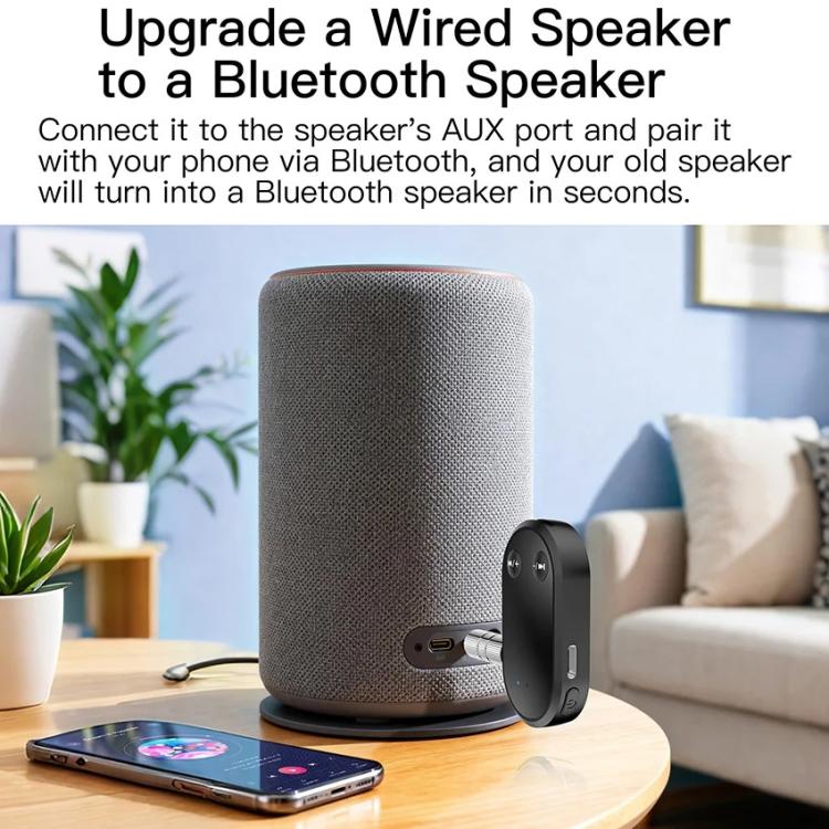 Black Bluetooth receiver connecting a wired speaker via 3.5mm AUX plug