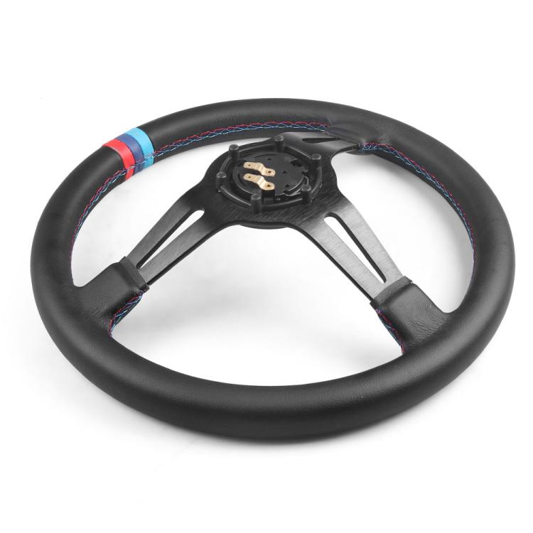 Black microfiber steering wheel with blue/red stitched rim and exposed rear mounting plate