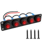 Black marine panel with five waterproof round LED switches, red I/O markings