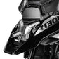 Clear headlight protector over motorcycle headlamp with metal mounting brackets