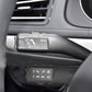 Steering wheel control button panel with illuminated-style icon labels