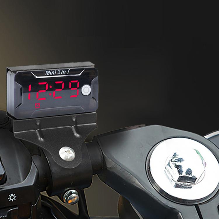 Three-in-one digital meter mounted on handlebar, showing red LED reading