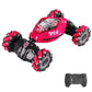 Pink stunt twist remote car with lights and black remote controller
