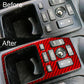 Center console panel sticker applied, red carbon fiber-style over dashboard controls