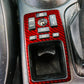 Center console panel sticker applied, red carbon fiber-style around buttons and display