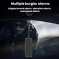 GPS anti-theft tracker held in hand, dark rectangular unit with antenna cable