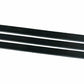 Close-up of black multi-V belt ribs with parallel ridged drive surface