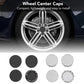 Wheel center caps set: four round black and silver caps shown on wheel