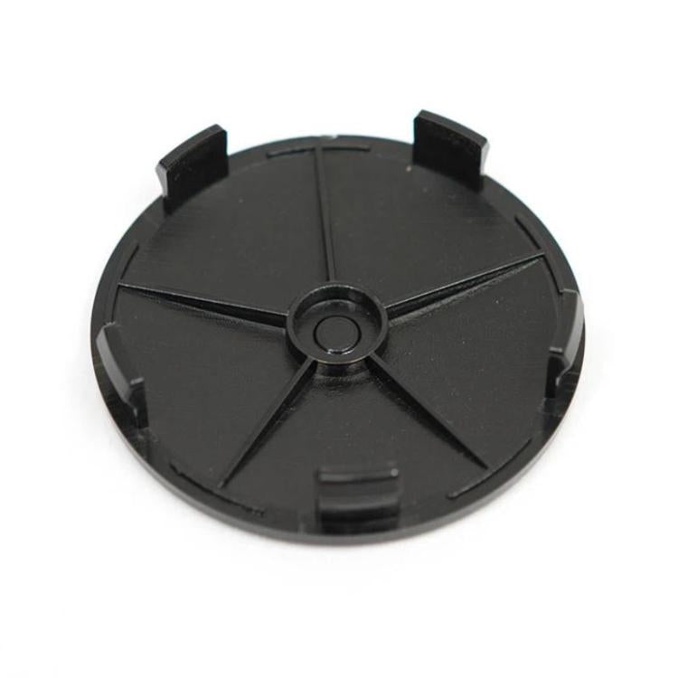 Black wheel hub center cap underside with mounting clips and support ribs (68mm)