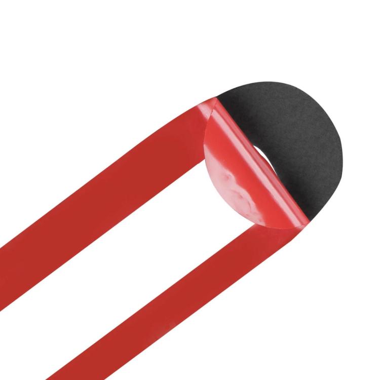 Red adhesive trim strip with angled edge for vehicle console stickers