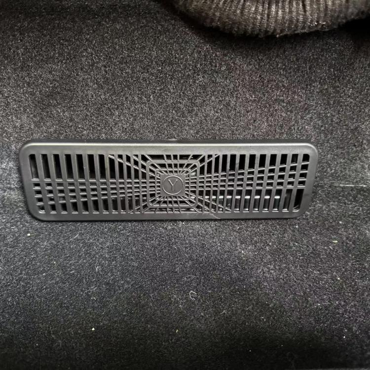 Under-seat air vent protective cover, rectangular gray grille insert with center emblem