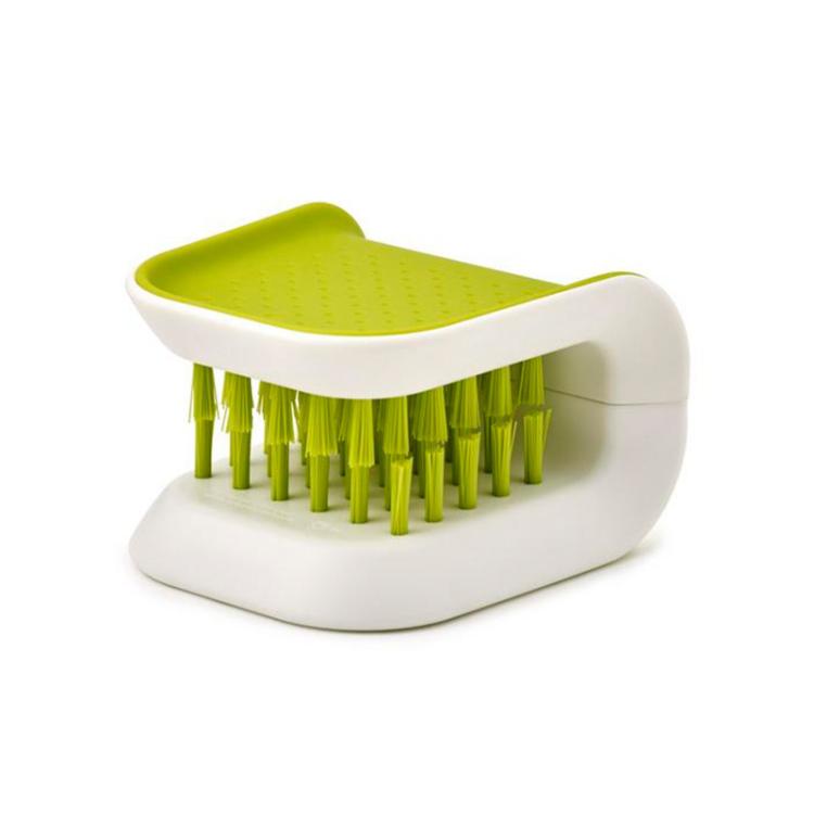 U-shaped dual-sided knife cleaning brush with green bristles and scrub pad