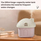 Pink mini house desktop humidifier with arched door, white roof, mist rising