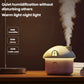 Mini house desktop humidifier with warm yellow light window and mist plume