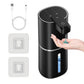 Wall-mounted electric soap dispenser, black body with black nozzle dispensing clear soap