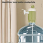 Green portable water pressurizer with white base and faucet spout over countertop