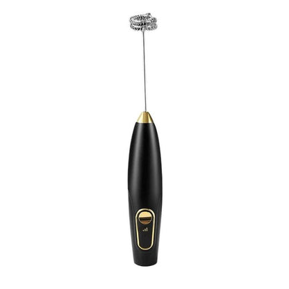 Black wireless handheld milk frother with stainless whisk attachment and power button.