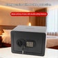 Black concealed wall safe with key and numeric keypad on the front access panel.