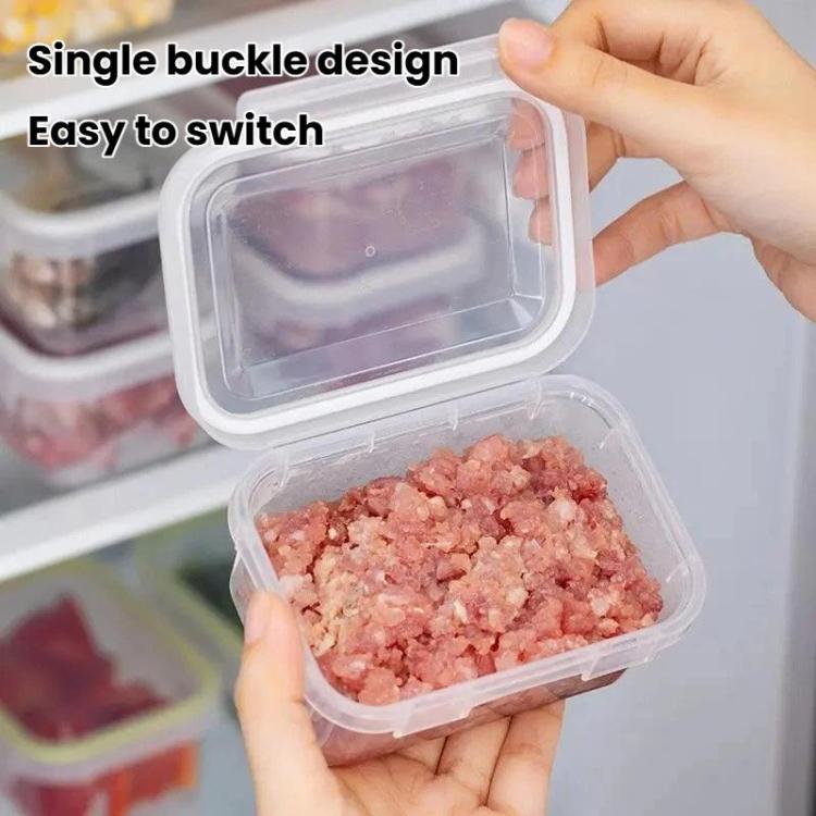 Clear airtight food container with single-lock buckle lid, held open by hands