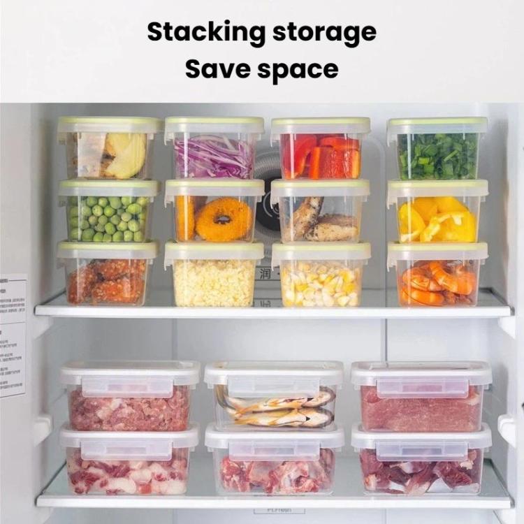 Set of clear lidded airtight food containers stacked in a refrigerator shelf