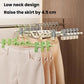 Adjustable pants hanger set with white clips and green accent hangers