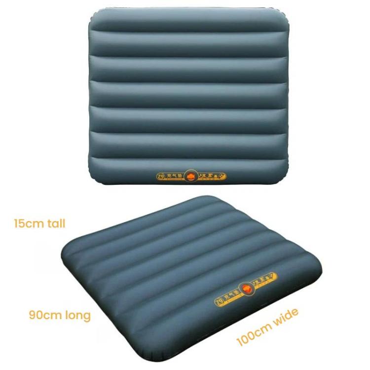 Inflatable car trunk air mattress, dark blue, ribbed surface on folded mat