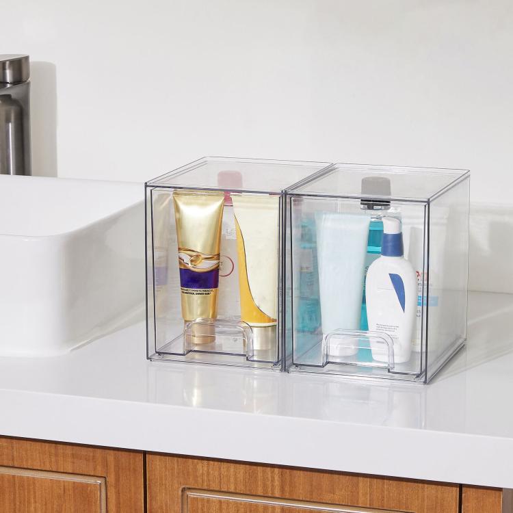 Clear two-section perfume organizer with front dust shields for bottles and tubes