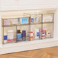 Clear cabinet-style perfume storage rack with multiple open-front compartments and covers