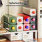 Set of stackable storage drawers with spherical knob handles in mixed colors