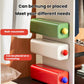 Wall-mountable storage boxes with green and white drawers and round knob pulls