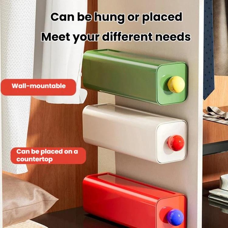 Wall-mountable storage boxes with green and white drawers and round knob pulls