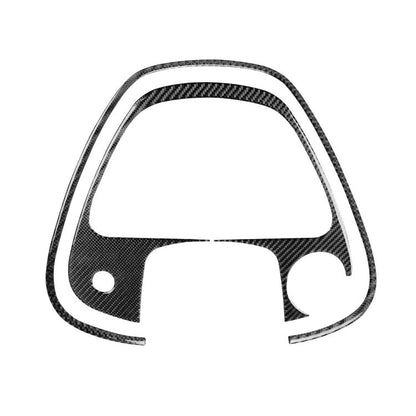 Black carbon-fiber speedometer surround sticker, curved outline for dashboard