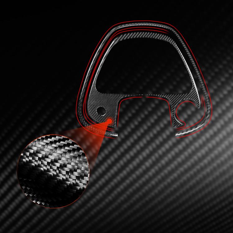 Red-accented black carbon-fiber speedometer surround sticker with textured detail