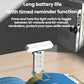 USB rechargeable clip reading lamp with LED folding bookmark on desk, lit.