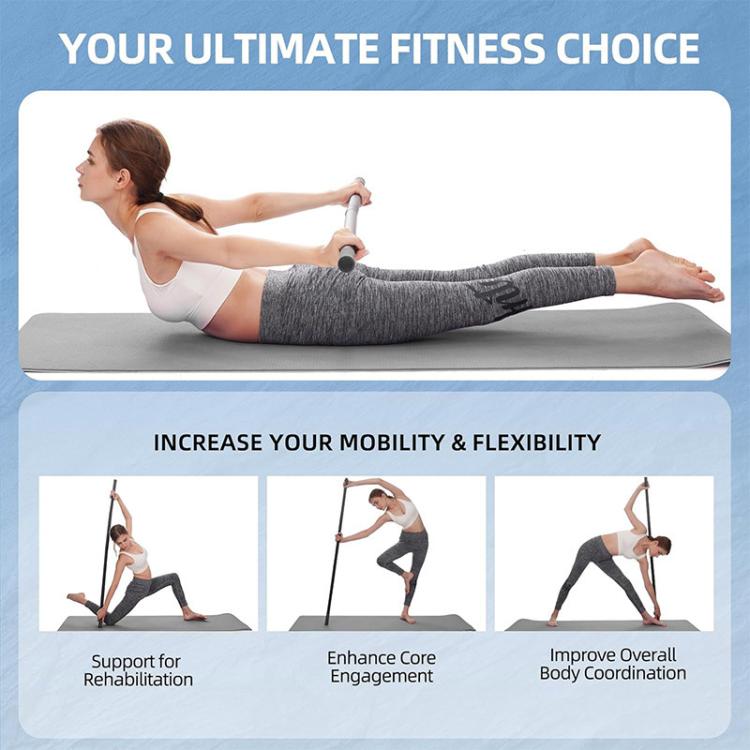 Black yoga stick for assisted core stretch, used while lying on mat